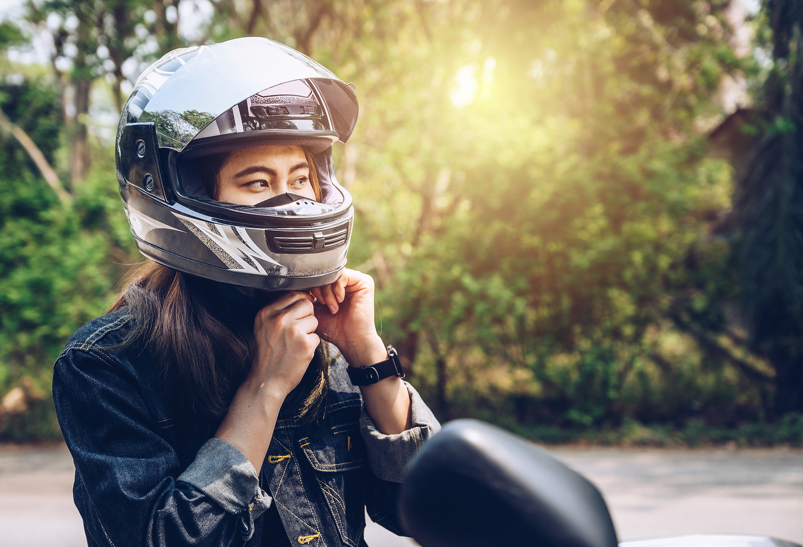 Woman About To Ride Motorcycle